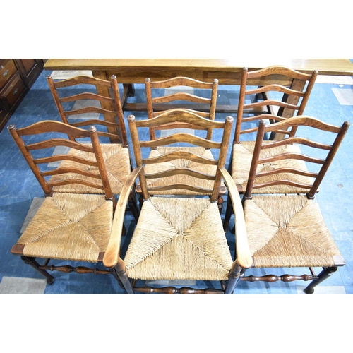 554 - A Set of Six Modern Rush Seated Ladder Back Chairs to Include One Carver