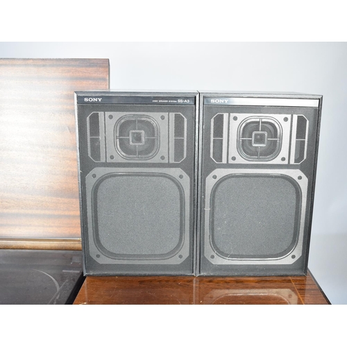 563 - A Modern Mahogany Cabinet Containing Sony Music System with Turntable, Tuner, Cassette Deck and CD P... 