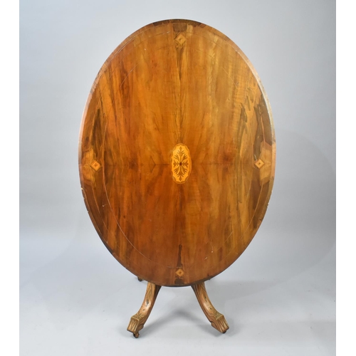 571 - A Late Victorian Inlaid Oval Snap Top Table with Carved Quatrefoil Base, 117x85cm