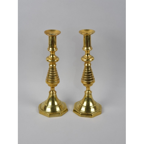 61 - A Pair of Victorian Brass Candlesticks, with Pushers, 30.5cms High, In Need of Some Attention