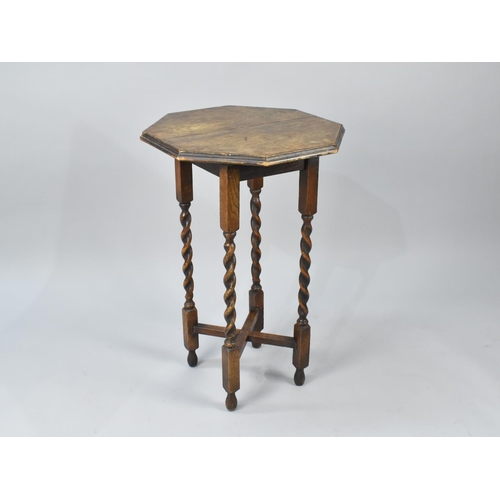 85 - An Edwardian Oak Octagonal Topped Occasional Table with Barley Twist Supports, 51cms Diameter