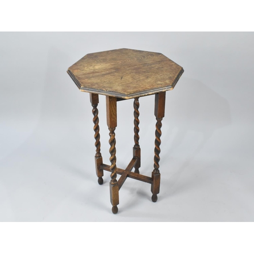 85 - An Edwardian Oak Octagonal Topped Occasional Table with Barley Twist Supports, 51cms Diameter