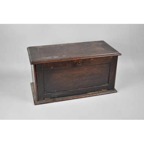 91 - An Edwardian Oak Storage Box with Pull Down Panelled Front, 43.5cms Wide