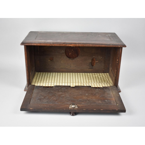 91 - An Edwardian Oak Storage Box with Pull Down Panelled Front, 43.5cms Wide