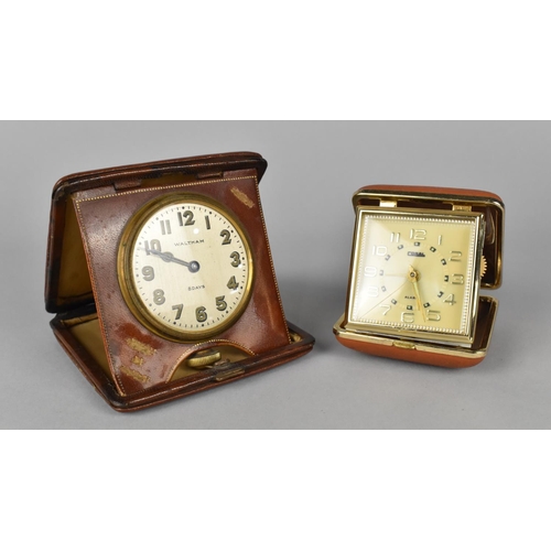 96 - An Edwardian Leather Cased Travelling Alarm Clock by Waltham, Movement requires Attention together w... 