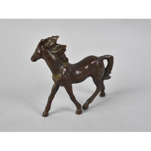 11 - A Patinated Bronze Study of a Trotting Horse, 9cms Long and 8cms High