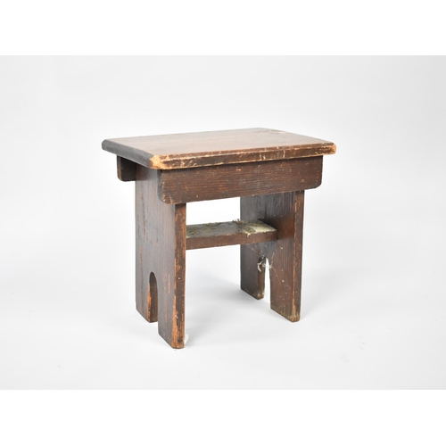 120 - A Stained Rustic Milking Stool, 28cms by 20cms and 28cms High