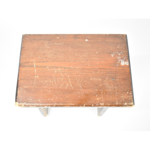 120 - A Stained Rustic Milking Stool, 28cms by 20cms and 28cms High