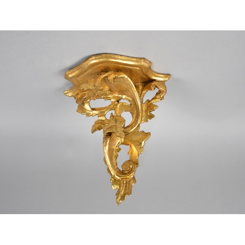 18 - A Continental Gilt Wall Sconce, in the Florentine Style, 22cms Wide and 24cms High