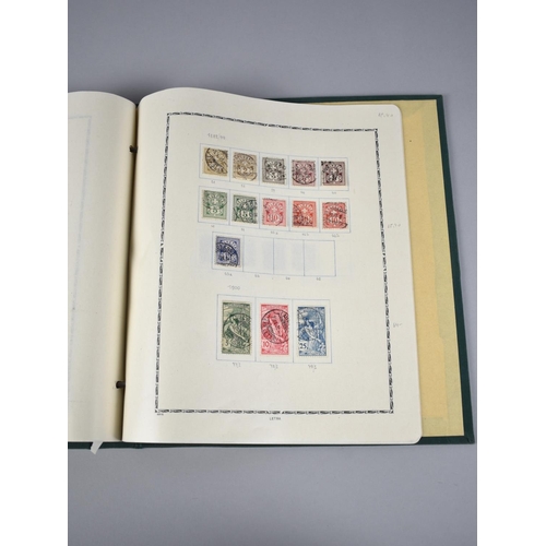 230 - A Stamp Album and Two Stamp Stock Books, One with Contents