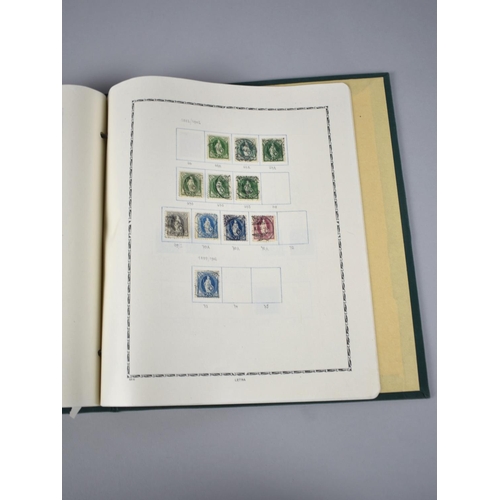 230 - A Stamp Album and Two Stamp Stock Books, One with Contents