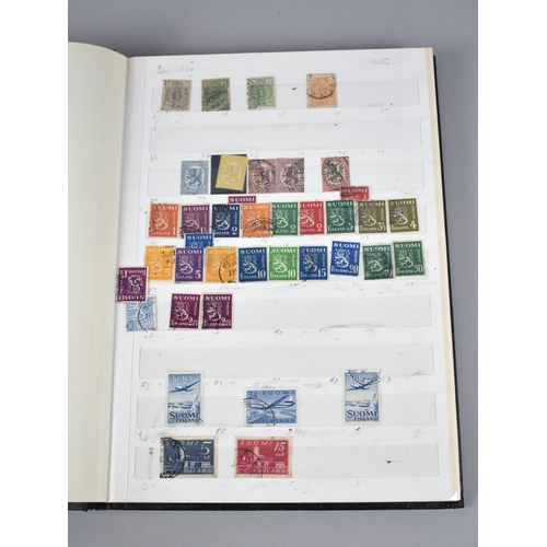 230 - A Stamp Album and Two Stamp Stock Books, One with Contents