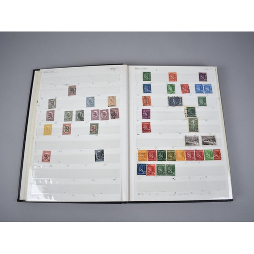 230 - A Stamp Album and Two Stamp Stock Books, One with Contents