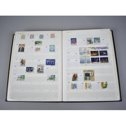 230 - A Stamp Album and Two Stamp Stock Books, One with Contents