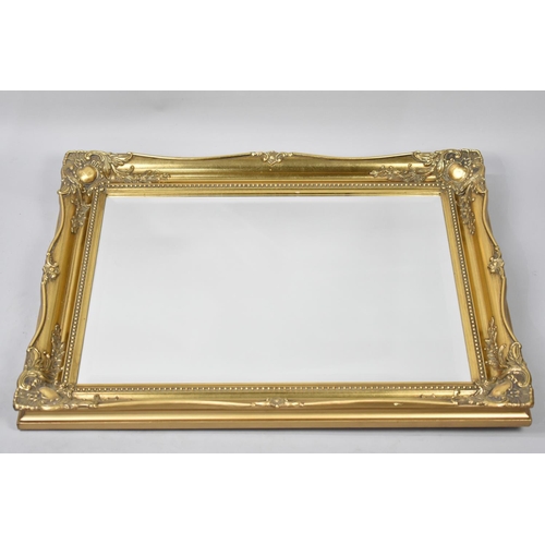 242 - A Modern Gilt Framed Rectangular Wall Mirror, 76x60cms Overall