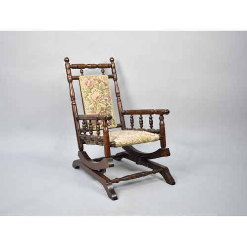 244 - A Childs American Rocking Chair with Tapestry Upholstery