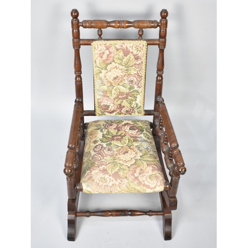 244 - A Childs American Rocking Chair with Tapestry Upholstery