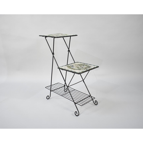 251 - A Wrought Iron and Mosaic Two Tier Off Set Plant Stand with Stretcher Shelf, 57cms Long