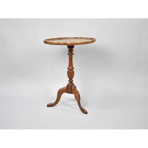 255 - A Modern Oval Topped Tripod Wine Table, Some Water Damage, 38.5cms Long