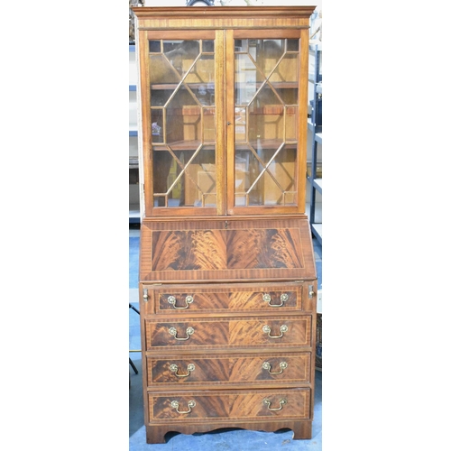 527 - A Late 20th Century Flame Mahogany Bureau Bookcase with Fall Front to Fitted interior. Four Long Bas... 