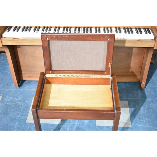 529 - A Modern Walnut Framed Upright Piano with Stool