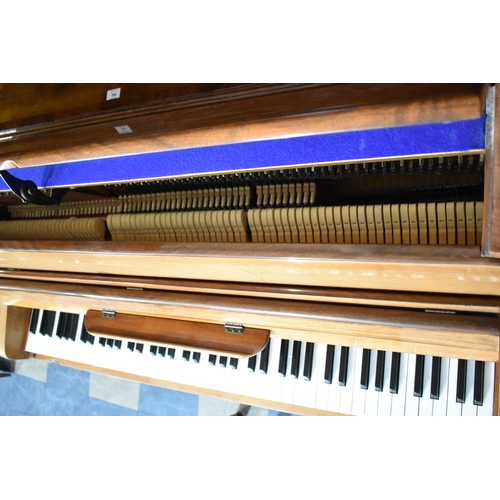 529 - A Modern Walnut Framed Upright Piano with Stool