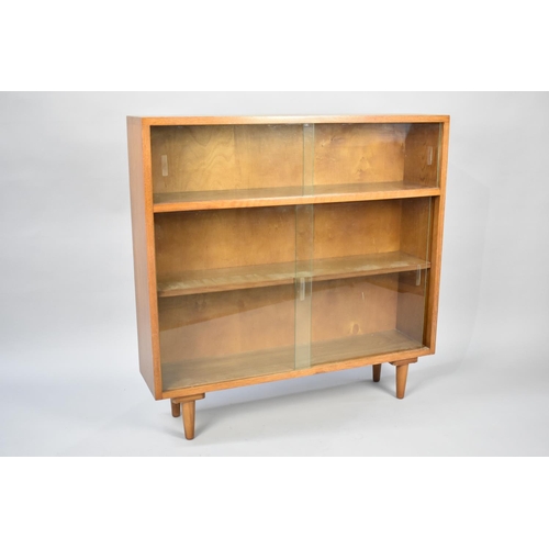 541 - A Mid 20th Century Glazed Bookshelf in Oak, 91cms Wide