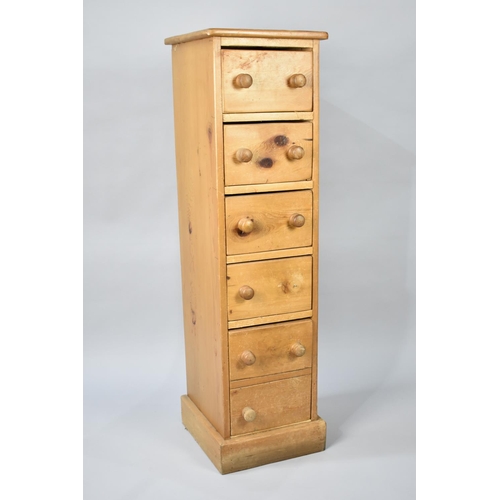 543 - A Modern Narrow Pine Chest of Six Drawers, Two Drawer Knobs Missing, 33cms Wide and 116cms High