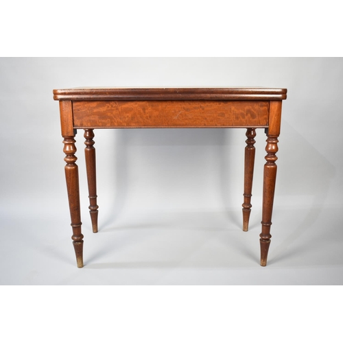 545 - A 19th Century Mahogany Lift and Twist Tea Table on Turned Supports, 91cms Wide