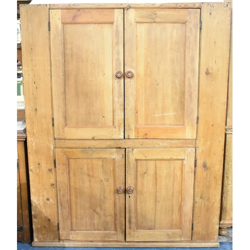 550 - A 19th Century Stripped Pine Double Pantry Cupboard with panelled Doors to Upper and Lower Shelf Sec... 