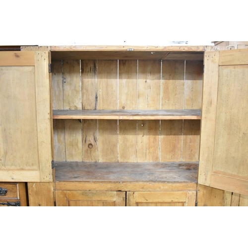 550 - A 19th Century Stripped Pine Double Pantry Cupboard with panelled Doors to Upper and Lower Shelf Sec... 