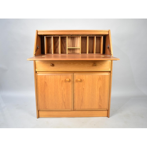 554 - A 1970s Fall Front Bureau with Fitted Interior, Centre Long Drawer and Base Cupboard, 84cms Wide