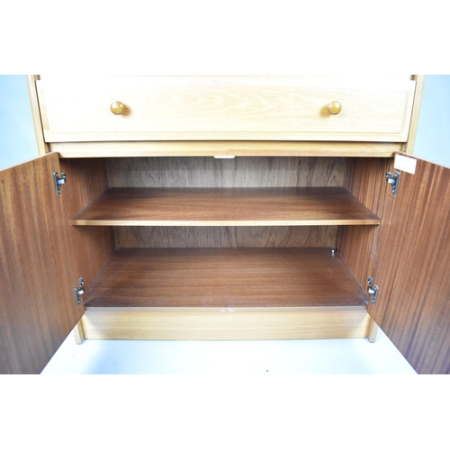 554 - A 1970s Fall Front Bureau with Fitted Interior, Centre Long Drawer and Base Cupboard, 84cms Wide