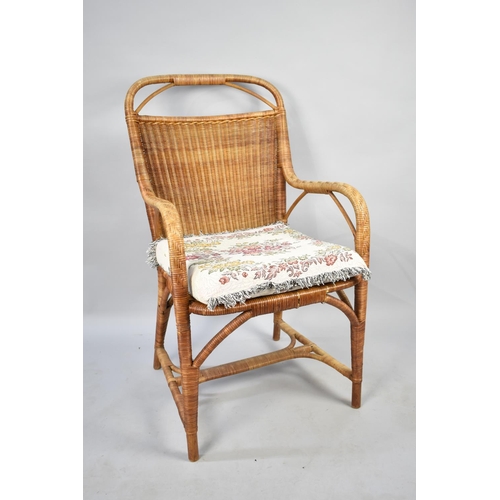 562 - A Vintage Dryad Furniture Wicker Armchair