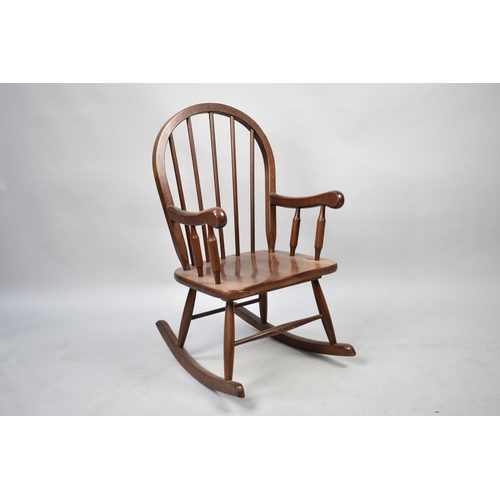 568 - A Mid 20th Century Spindle Back Childs Rocking Chair