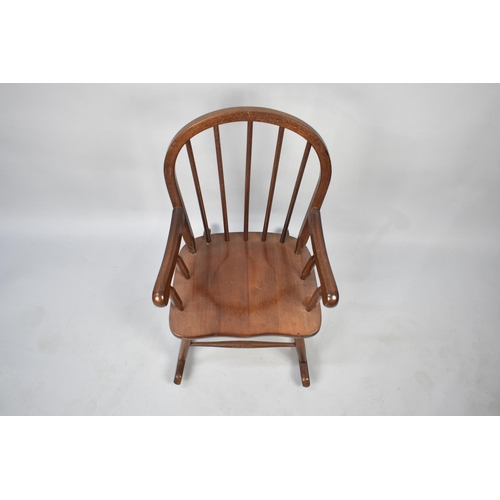 568 - A Mid 20th Century Spindle Back Childs Rocking Chair