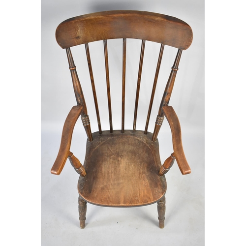 572 - A Mid 20th Century Spindle Back Kitchen Armchair