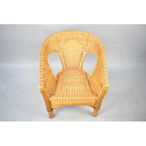 574 - A Modern Woven Wicker Tub Armchair