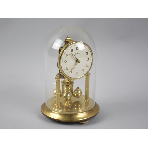 65 - A Mid 20th Century Brass Bentima Pillar Clock under Glass Dome, 17.5cms High