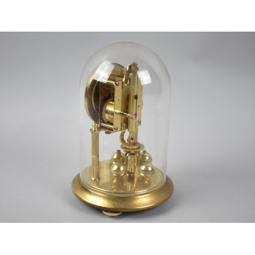 65 - A Mid 20th Century Brass Bentima Pillar Clock under Glass Dome, 17.5cms High