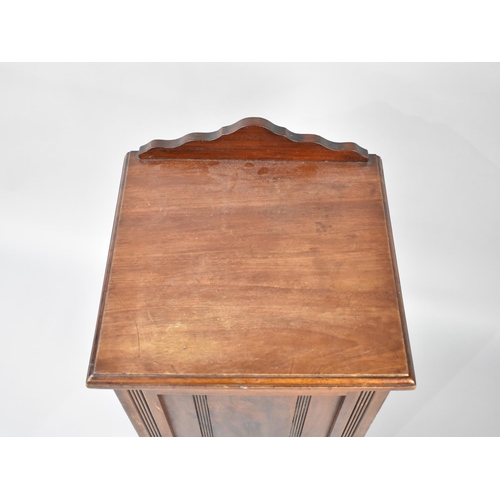 76 - An Edwardian Mahogany Bedside Cabinet with Galleried Back, 38cms Wide and 83cms High