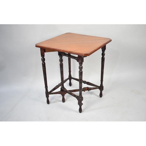 83 - An Edwardian Mahogany Corner Table with Front Gate Leg Drop Leaf, Turned Supports, 70cm Wide and 36c... 