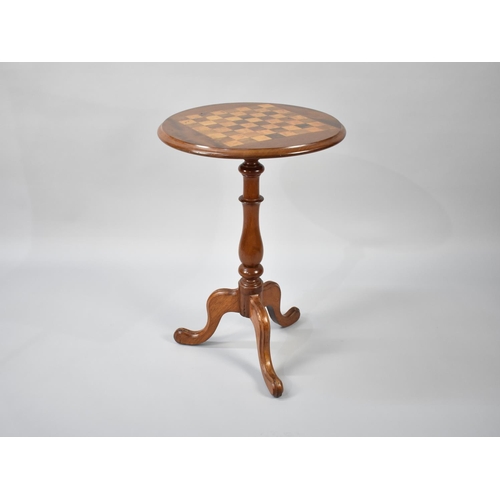 84 - A Circular Tripod Games Table with Chess Board Top in Rosewood, Maple and Mahogany, 48cms Diameter