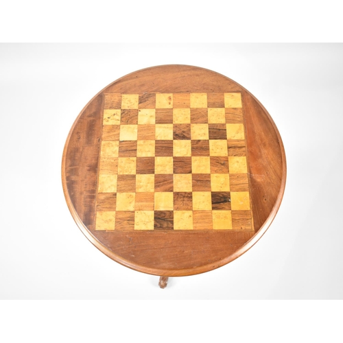 84 - A Circular Tripod Games Table with Chess Board Top in Rosewood, Maple and Mahogany, 48cms Diameter