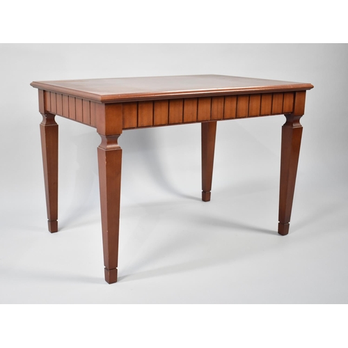 87 - A Modern Mahogany Rectangular Coffee Table with Crossbanded Top and Tapering Square Supports, 77cms ... 