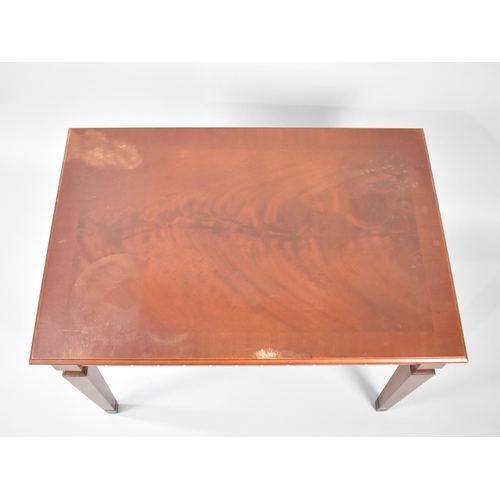 87 - A Modern Mahogany Rectangular Coffee Table with Crossbanded Top and Tapering Square Supports, 77cms ... 