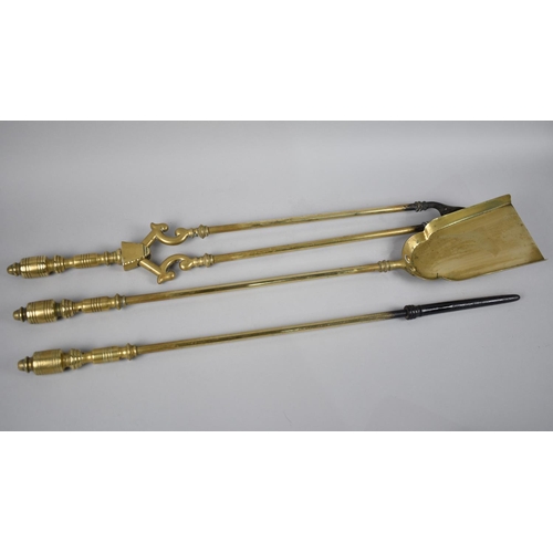 95 - A Set of Three Brass Long Handled Fire Irons, Poker 63cms Long