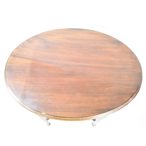 97 - An Edwardian Mahogany Oval Topped Occasional Table on Tapering Square Supports, with Oval Stretcher ... 