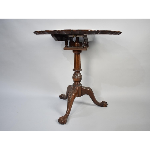 243 - A Reproduction Mahogany Tripod Table with Circular Pie Crust Top, Bird Cage Support and Carved Tripo... 