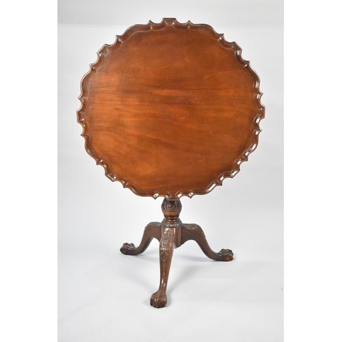 243 - A Reproduction Mahogany Tripod Table with Circular Pie Crust Top, Bird Cage Support and Carved Tripo... 